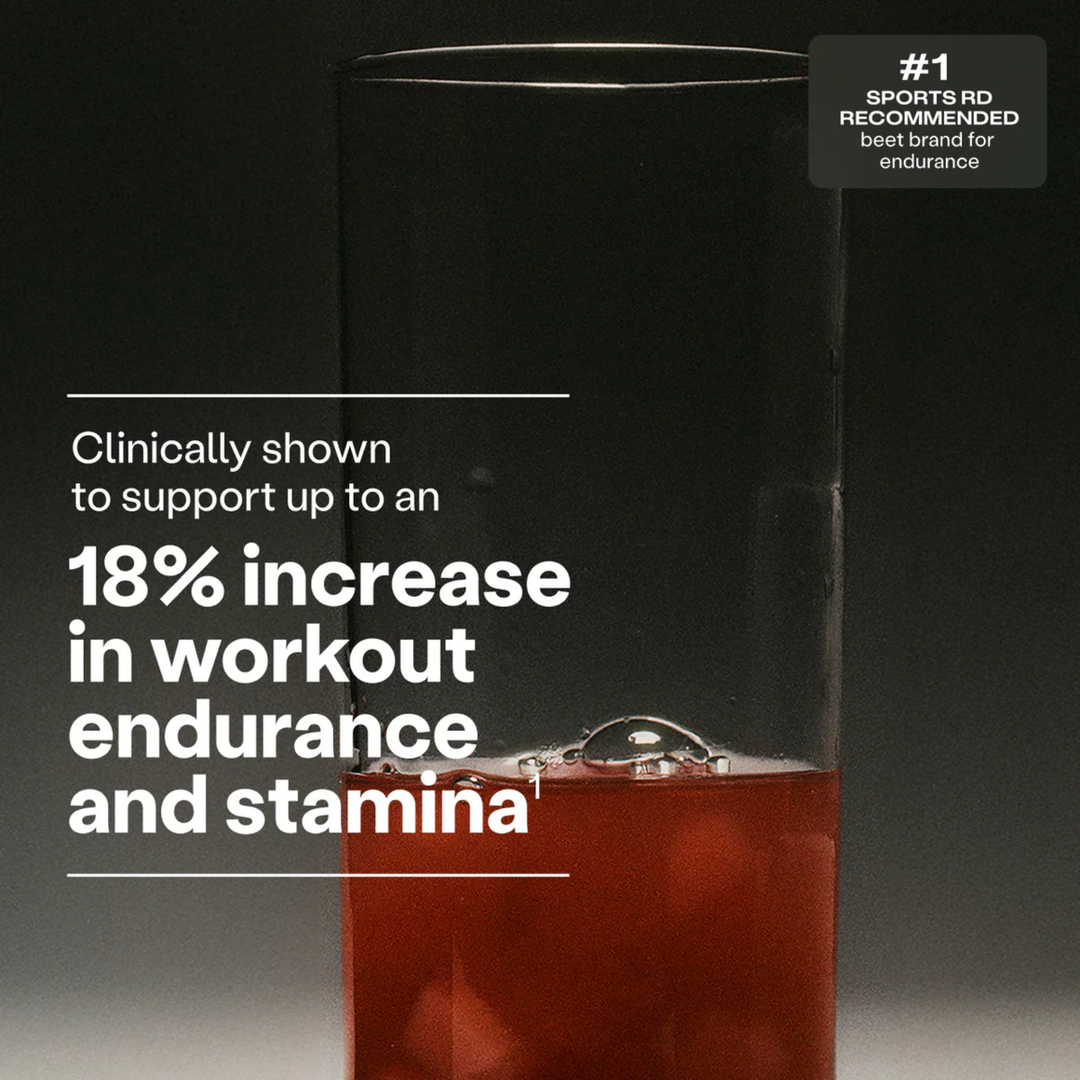 Glass of red liquid with text about workout endurance and stamina on a dark background